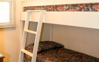 The Eagle's Nest bedroom with built-in bunk beds suitable for children