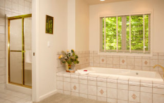 West Ridge master bath with a whirlpool tub and shower