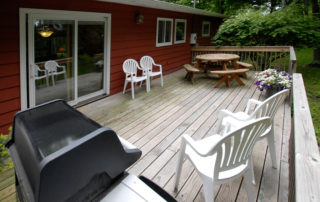 Falun House deck with gas grill and picnic table