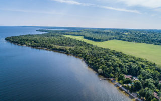 Aerial view on The Shallows Resort on the Bay surrounded by trees