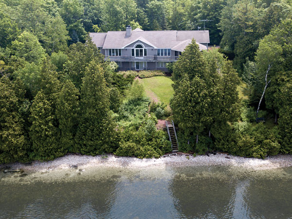 West Ridge is a three-bedroom, two-and-a-half-bath home with 200 feet of private shoreline